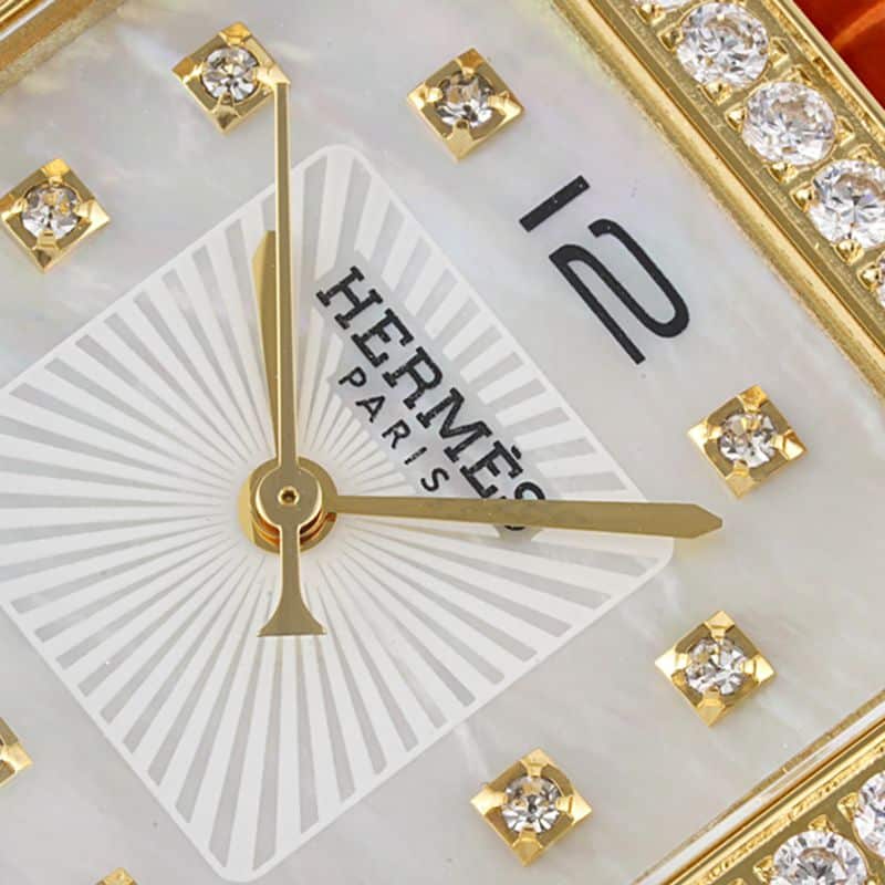 爱马仕顶级高仿手表HeureH大三针系列女士石英白盘腕表细节图