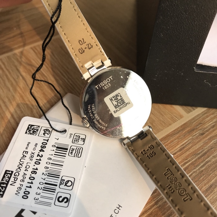 原单顶级复刻手表天梭女款白盘白带佛拉明戈系列石英腕表底盖图
