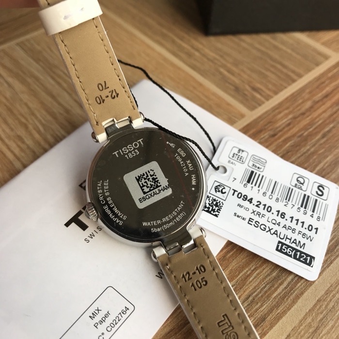 原单顶级复刻手表天梭女款白盘白带 佛拉明戈系列石英皮带腕表底盖图