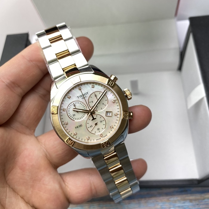 原单顶级复刻手表天梭女款白盘间金带经典腕表正面图