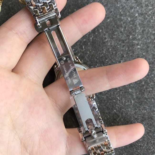 DK厂顶级复刻欧米茄超a手表女款白盘金钢带天然真钻蝶飞系列石英手表表扣图