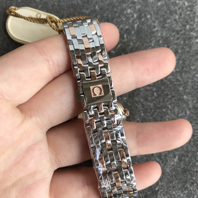 DK厂顶级复刻欧米茄超a手表女款白盘金钢带天然真钻蝶飞系列石英手表表扣图