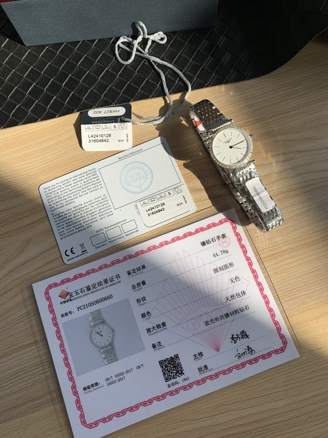 顶级复刻手表浪琴女款白盘钢带休闲时尚石英嘉岚系列手表正面图