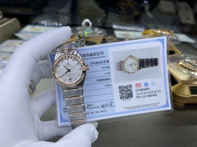 顶级复刻手表欧米茄女款白盘钢带双鹰星座系列真金真钻手表正面图