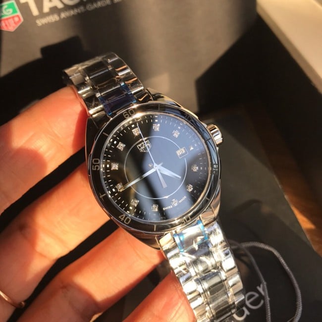 原单手表泰格豪雅女款石英黑盘钢带竞潜系列手表正面图
