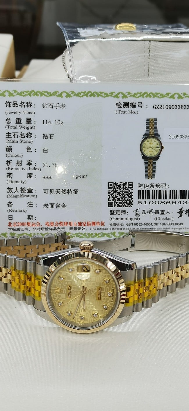 劳力士顶级复刻手表真金真钻男款金盘间金星期日志型全自动机械手表正面图