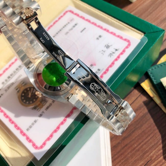 顶级复刻劳力士原单手表女士日志型系列黑盘间金带全自动机械表扣图