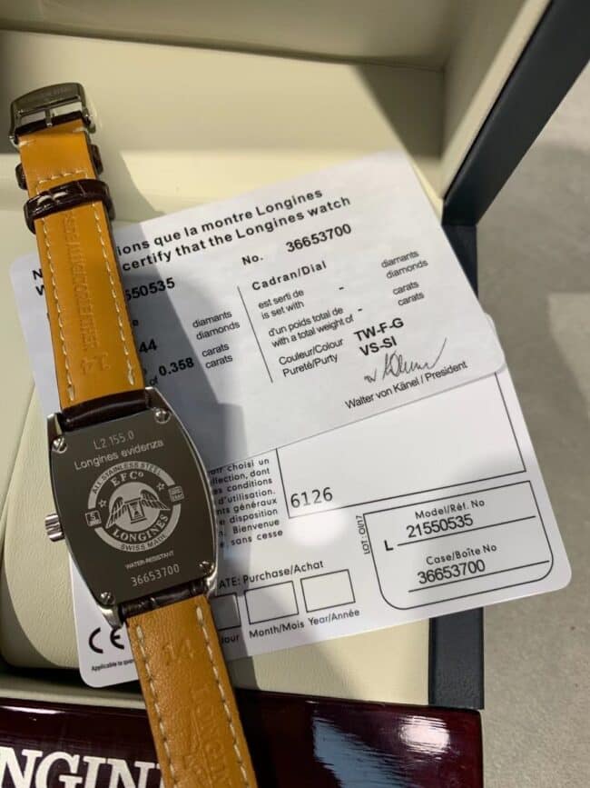 顶级复刻原单浪琴典藏系列L2.155.0.53.5经典的酒桶形精钢表壳圈钻黑底女士石英手表底盖图