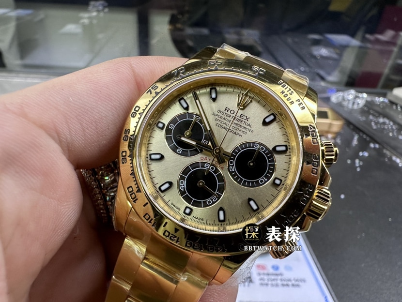 劳力士宇宙计型迪通拿真金真钻定制一比一顶级复刻手表男士香槟色熊猫盘钢带款正面实拍图