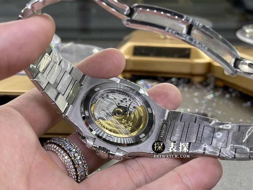 百达翡丽运动优雅真金真钻定制顶级复刻手表男士蒂芙尼蓝盘镶钻钢带款背面实拍图