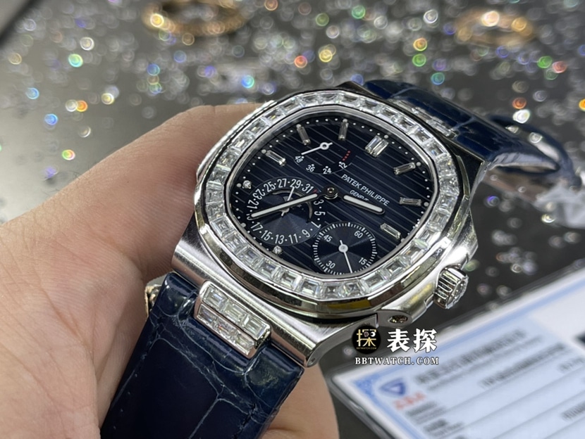 百达翡丽运动优雅真金真钻定制顶级复刻手表男士黑蓝盘镶钻月相皮带款正面实拍图