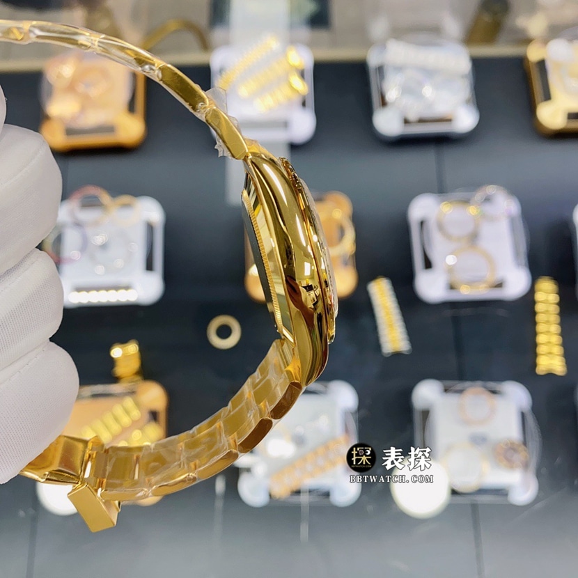 劳力士宇宙计型迪通拿真金真钻定制超A高仿手表男士白色珍珠母熊猫盘钢带款侧面实拍图