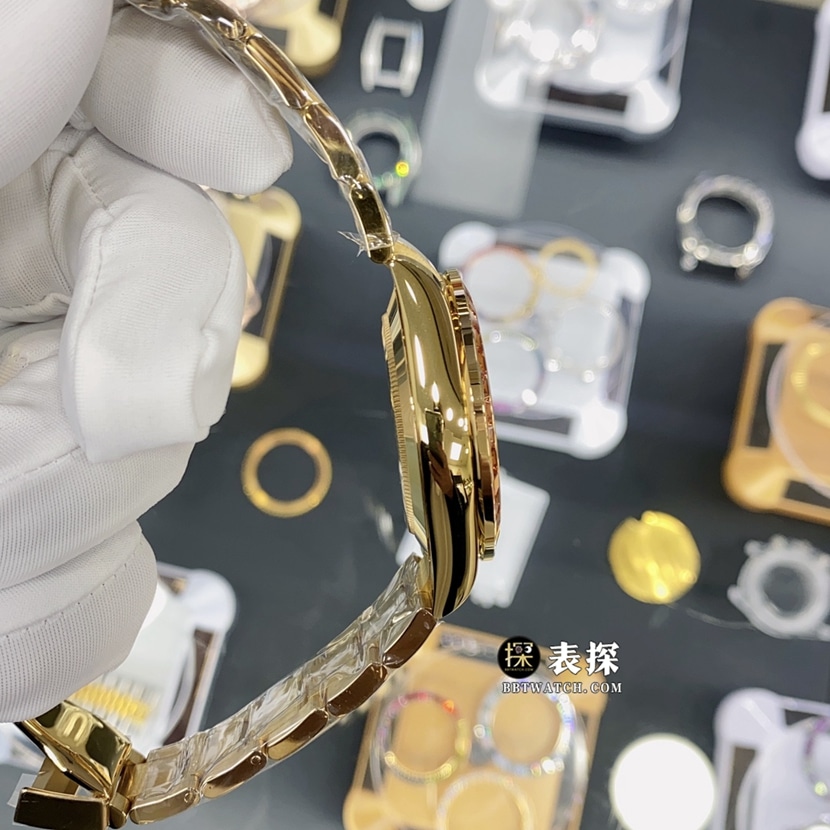 劳力士迪通拿真金真钻定制一比一顶级复刻手表男士白色贝母盘黄金镶钻钢带款侧面实拍图