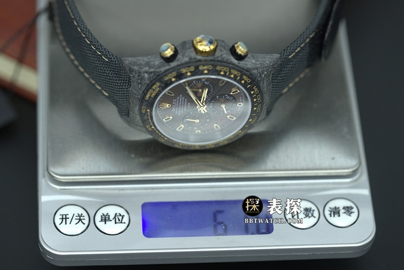 Diw厂劳力士男士宇宙计时迪通拿顶级一比一高仿手表渐变棕盘橡胶款重量实拍图