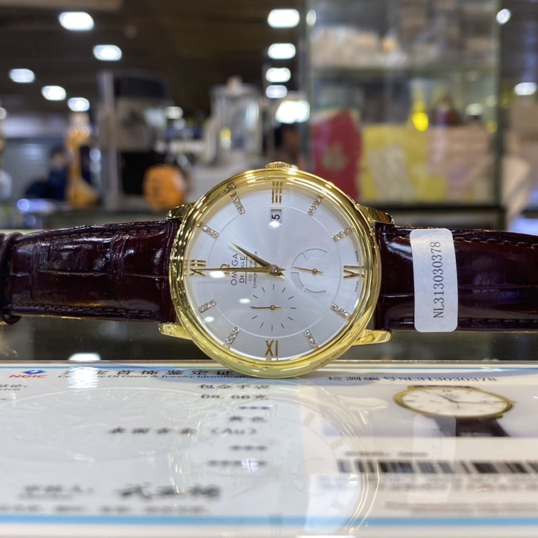 蝶飞欧米茄1:1复刻手表18K金圆盘黄皮带正面图