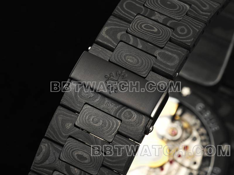 百达翡丽顶级复刻手表DIW厂鹦鹉螺橙盘碳纤维机械钢带款5711表带实拍图