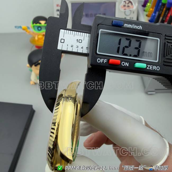 顶级复刻手表PPM厂劳力士星期日历机械黑盘黄金侧面实拍图