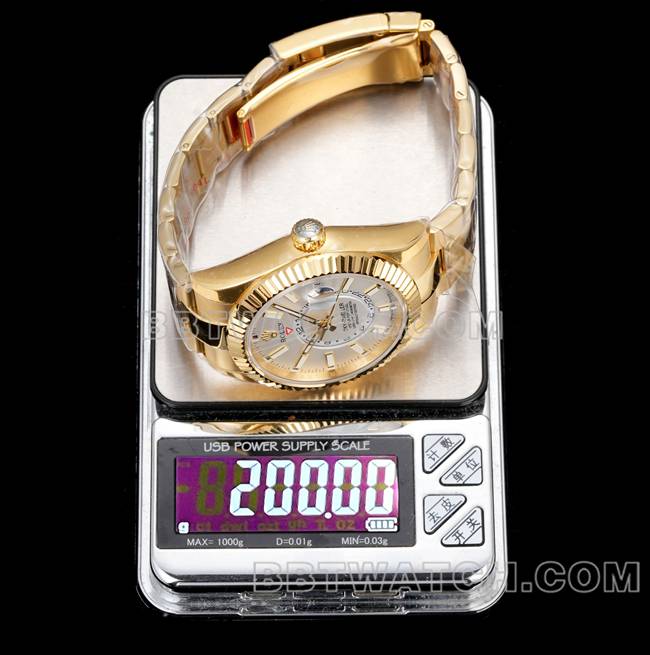 AR+厂超级克隆手表纵航者劳力士白盘机械黄金钢表带重量实拍图