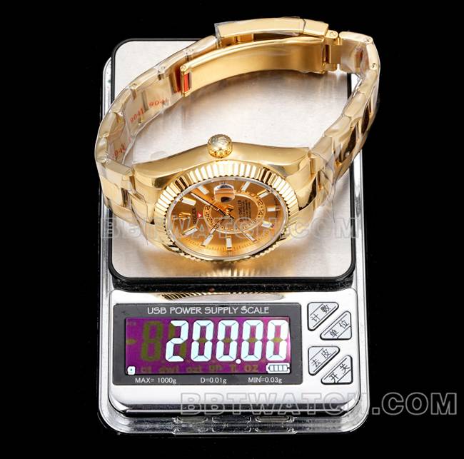 AR+厂顶级复刻手表劳力士纵航者金盘机械黄金钢表带重量实拍图