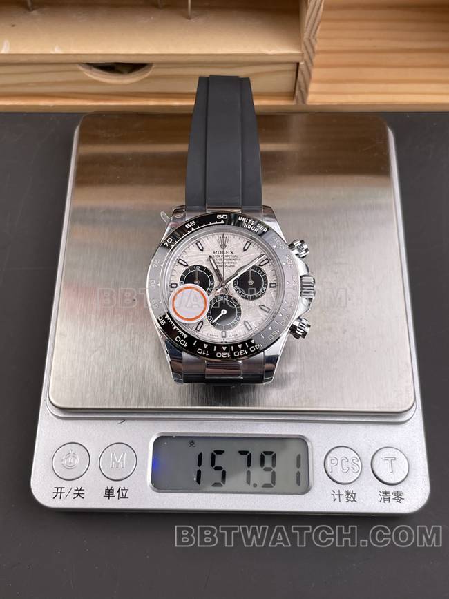 1:1复刻手表QF厂迪通拿劳力士银灰盘4131机械重量实拍图