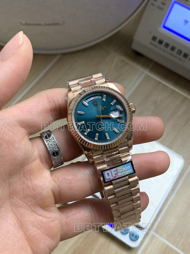 最佳复刻手表QF厂星期日历劳力士冰蓝盘玫瑰金2836机械36mm正面实拍图